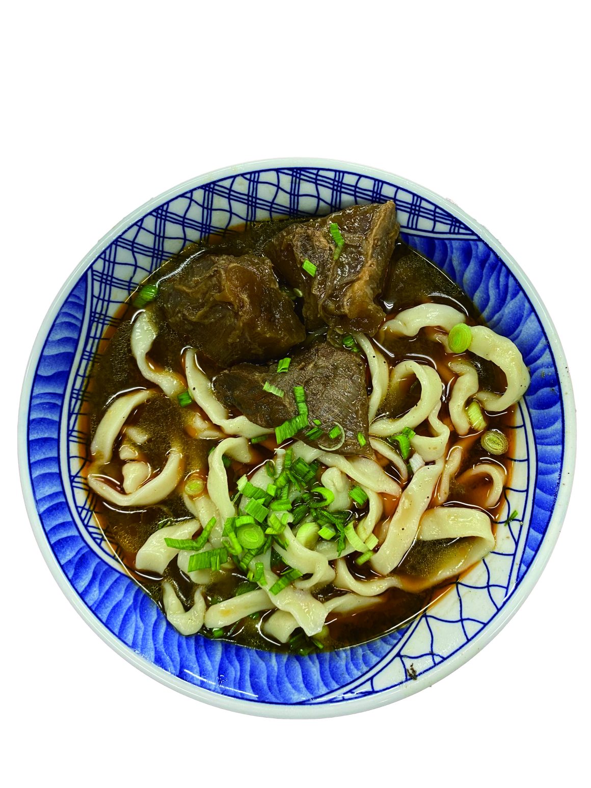 The braised beef noodles at Muslim Beef Noodles Restaurant feature tender beef, resilient noodles, and a rich flavorful broth. (Photo・Kuan Yuan Chu)